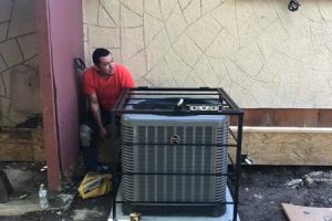 HVAC technician installing a central air conditioner in a San Antonio home